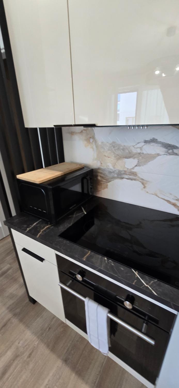 Kitchen or kitchenette, stove
