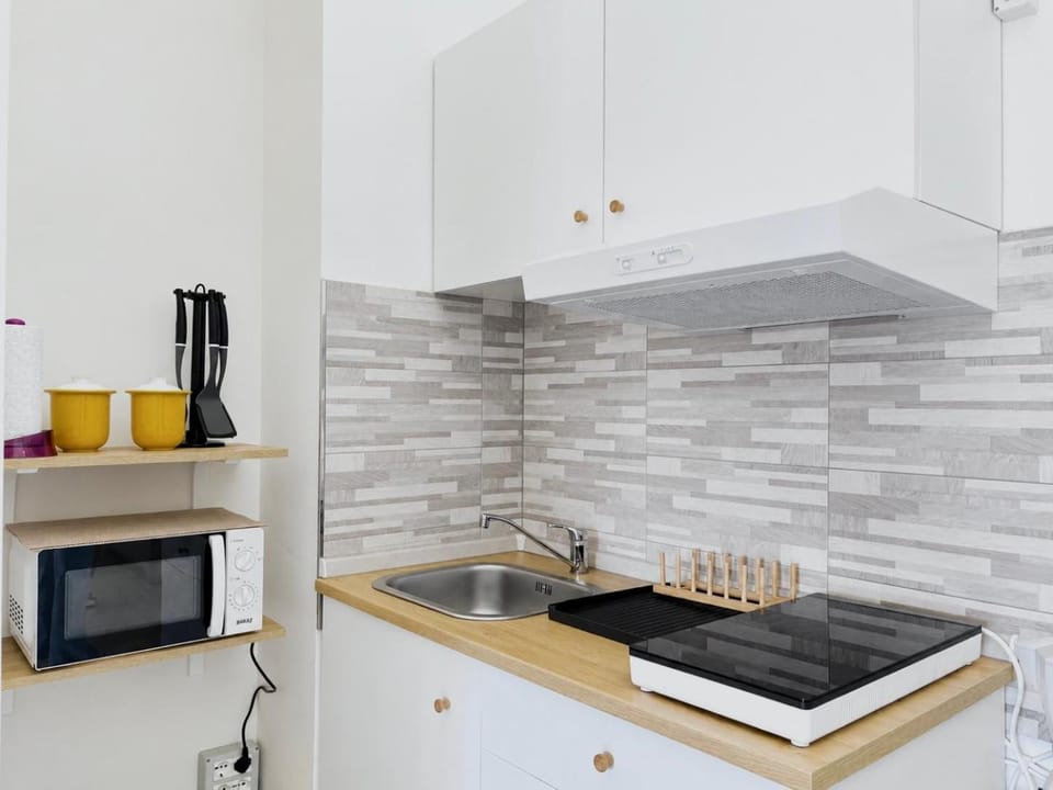 Kitchen or kitchenette, stove