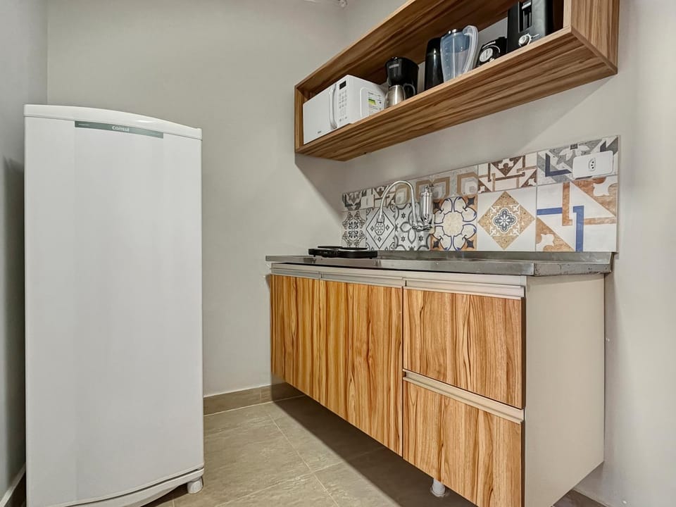 Kitchen or kitchenette, microwave, stove