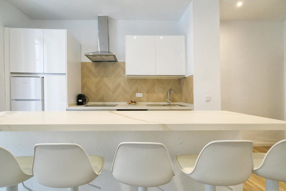 Kitchen or kitchenette, Dining area, microwave, oven, stove, washing machine
