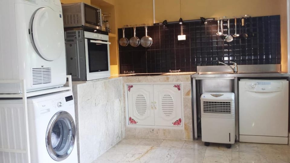 microwave, oven, stove, washing machine, kitchen