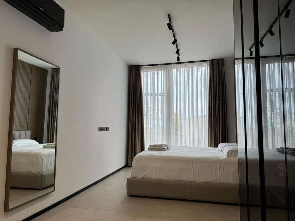 Bed, Photo of the whole room, Bedroom, towels, air conditioner