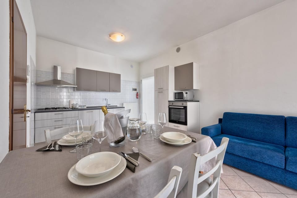 Living room, Seating area, Dining area, dishwasher, oven, stove