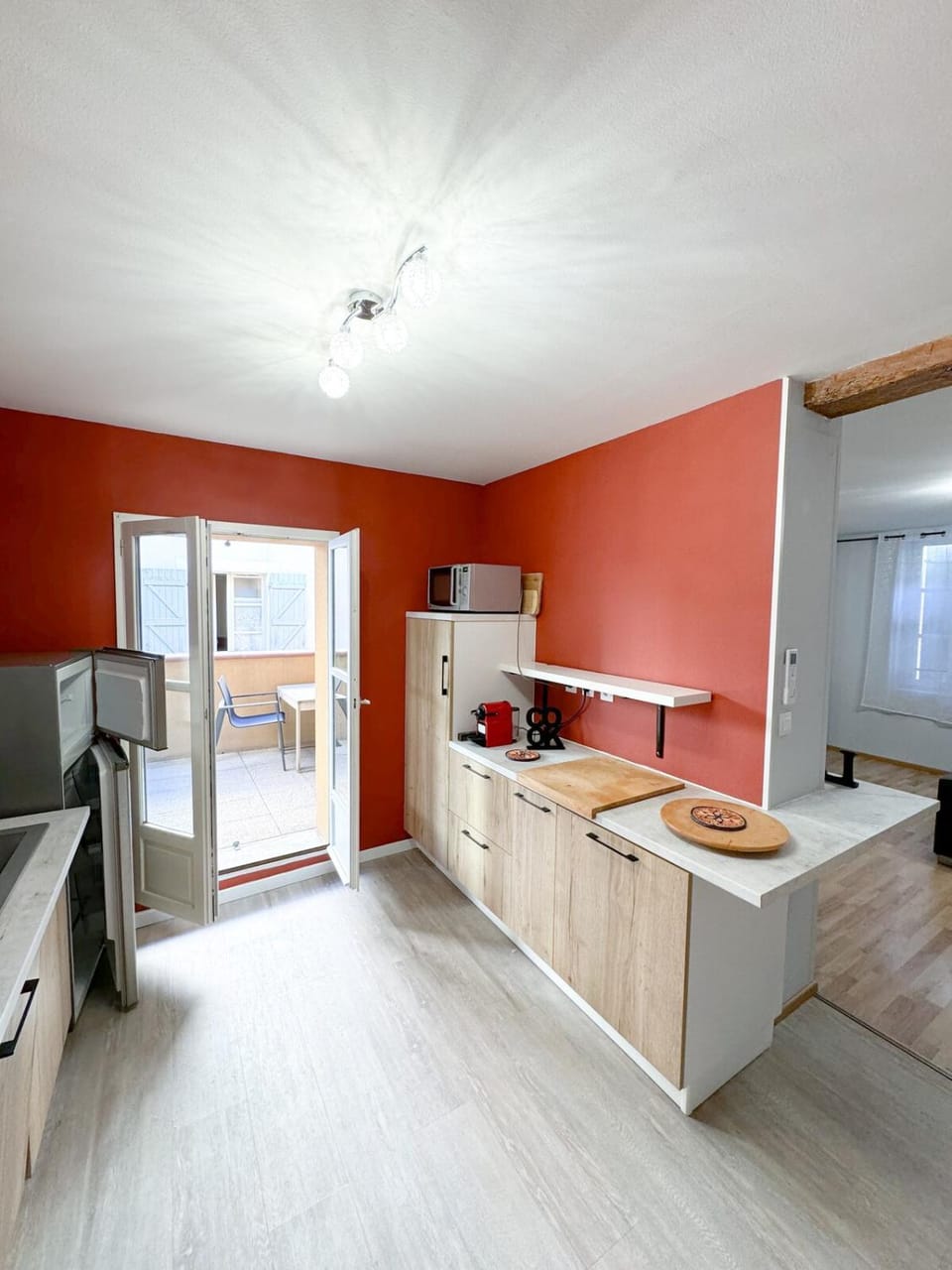 Kitchen or kitchenette, dishwasher, oven, stove
