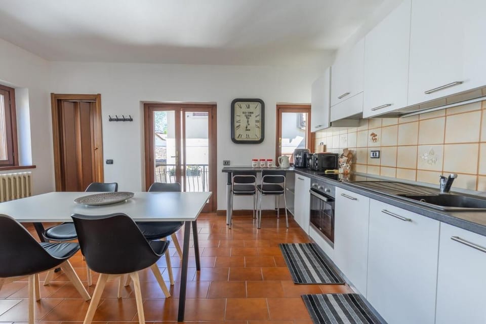 Kitchen or kitchenette, dishwasher, oven, stove