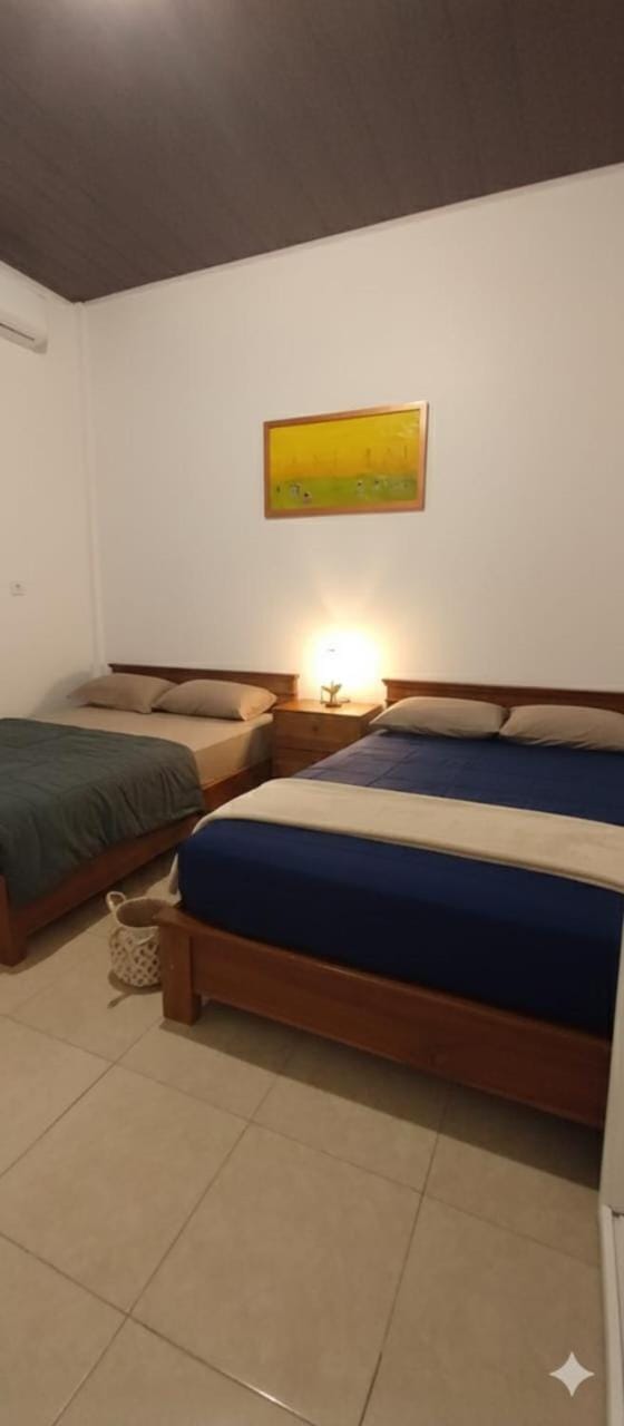 White Guest House Bed and Breakfast in Sekongkang
