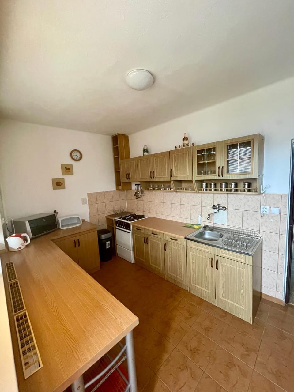 Kitchen or kitchenette, stove