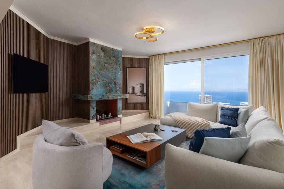Natural landscape, TV and multimedia, Living room, Seating area, Evening entertainment, Sea view, fireplace