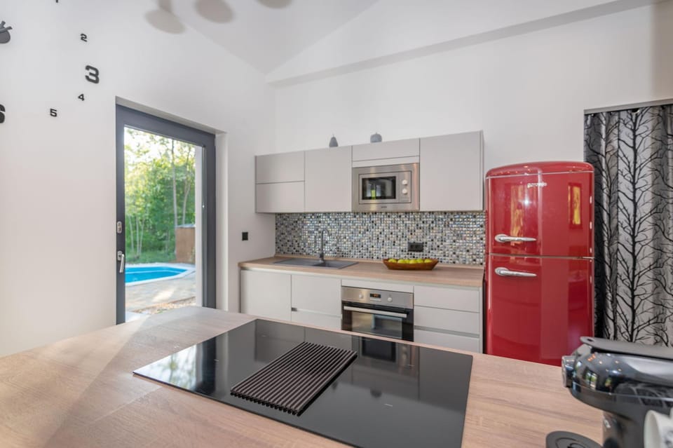 Kitchen or kitchenette, oven, stove, toaster