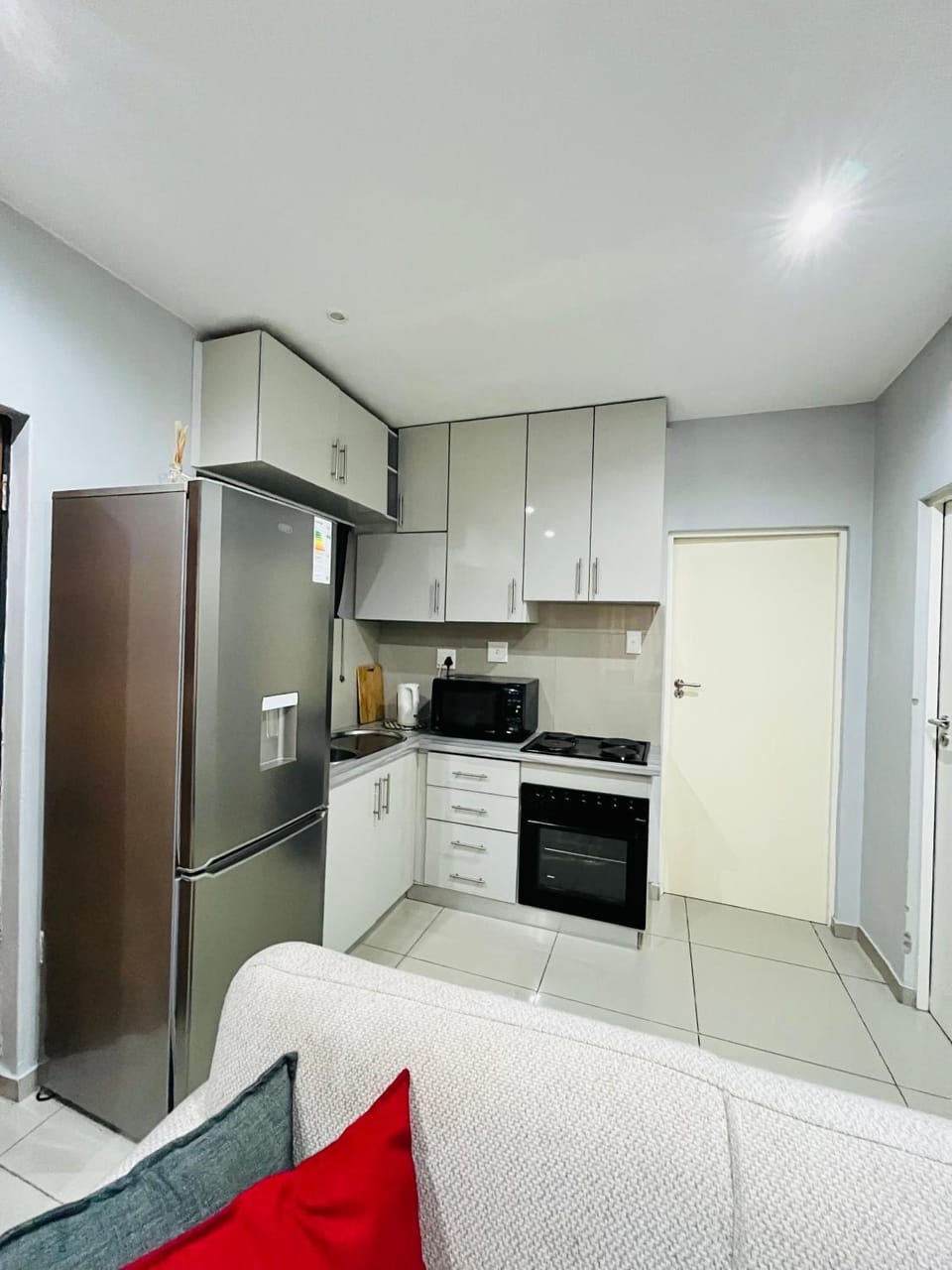 Kitchen or kitchenette, oven, stove