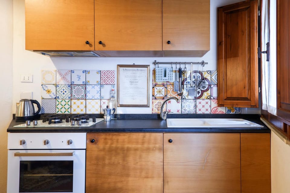 Kitchen or kitchenette, oven, stove