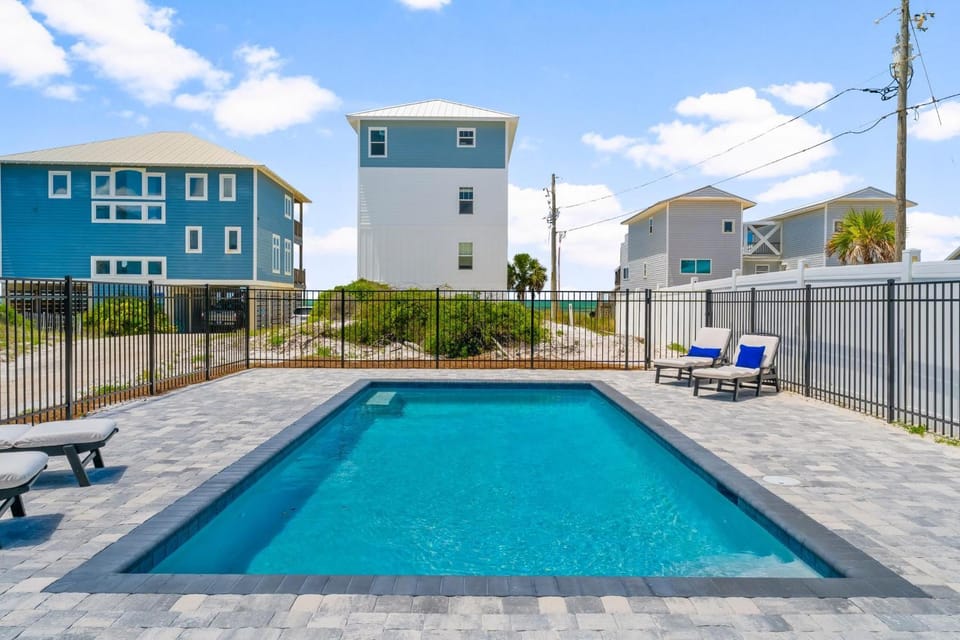 Property building, Patio, Day, Natural landscape, View (from property/room), Pool view, Sea view, Swimming pool, sunbed