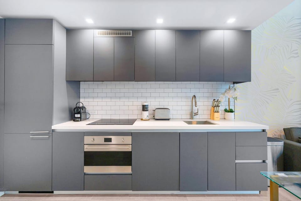 Kitchen or kitchenette, stove, toaster