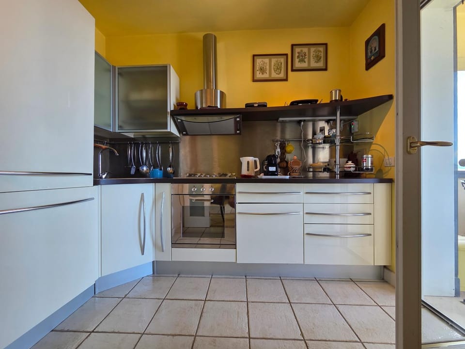 Kitchen or kitchenette, oven, stove, toaster