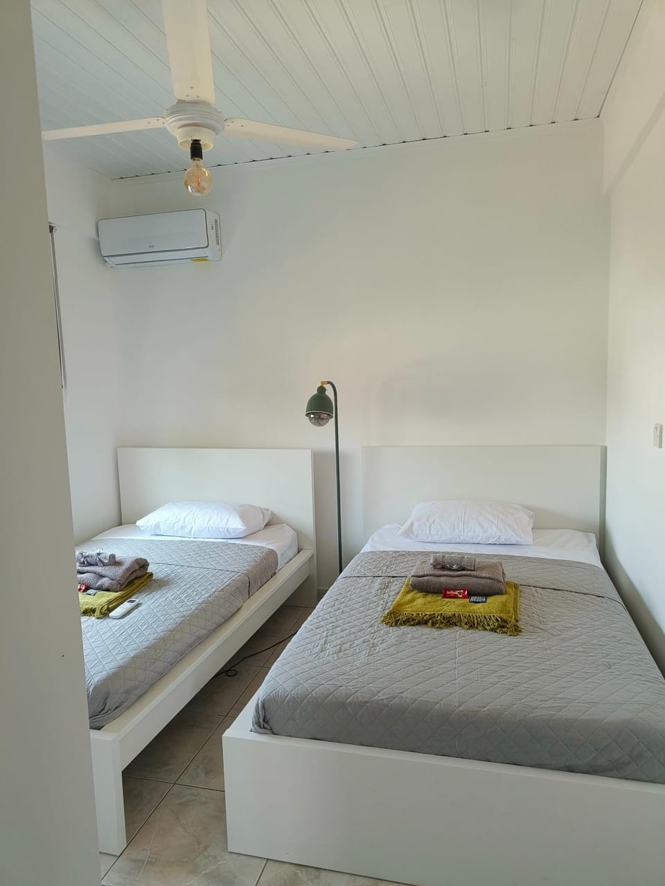Photo of the whole room, Bedroom, towels, air conditioner
