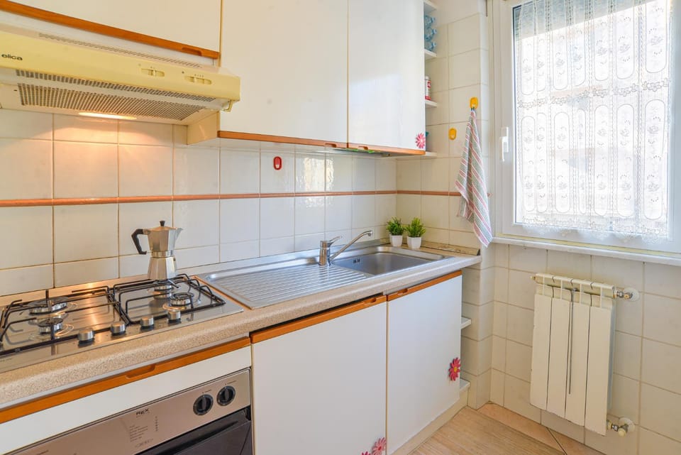 Kitchen or kitchenette, stove