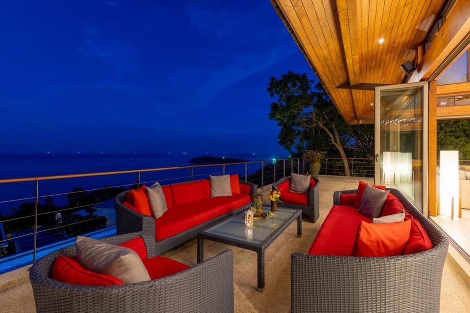 Patio, Night, View (from property/room), Balcony/Terrace, Living room, Seating area, Sea view