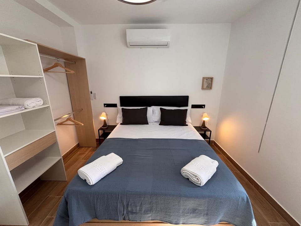 Bed, Photo of the whole room, Bedroom, towels, wardrobe, air conditioner