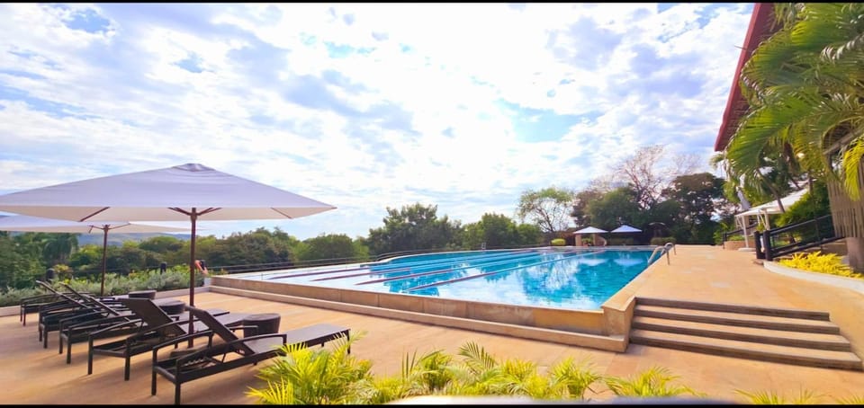 Property building, Restaurant/places to eat, Swimming pool, Swimming pool, Breakfast