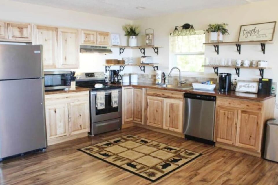 Kitchen or kitchenette, dishwasher, oven, stove, toaster