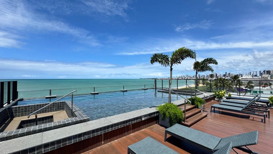 View (from property/room), Balcony/Terrace, Pool view, Sea view, Swimming pool, sunbed