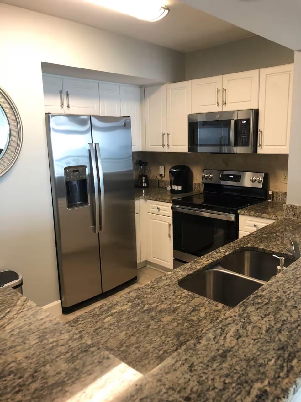 Kitchen or kitchenette, Breakfast, dishwasher, microwave, oven, stove, toaster, kitchen