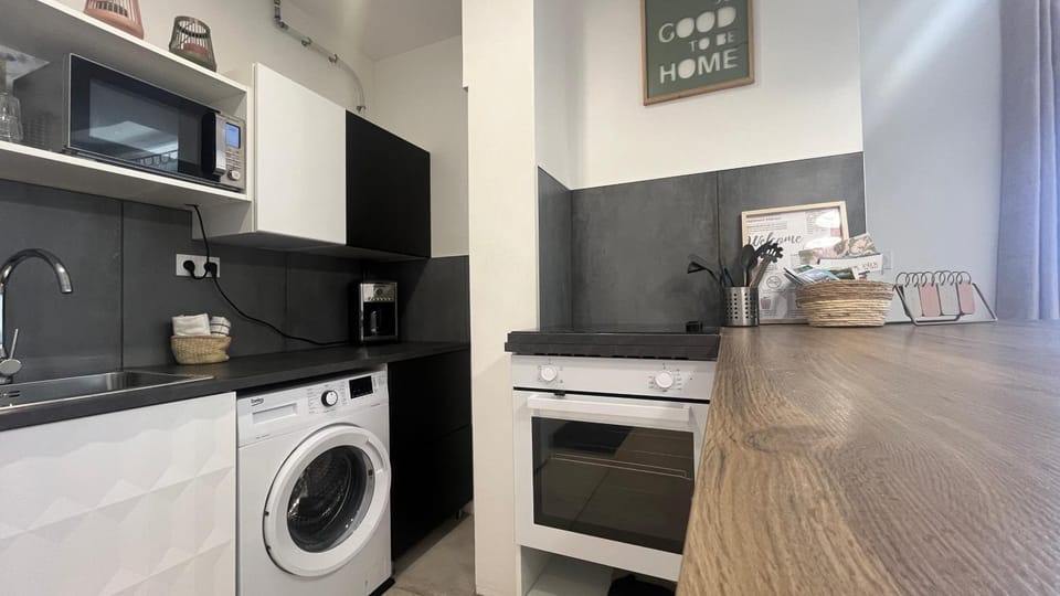 microwave, oven, stove, washing machine, kitchen