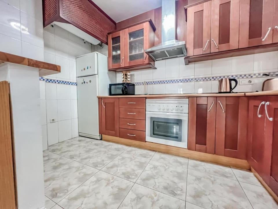 Kitchen or kitchenette, oven, stove