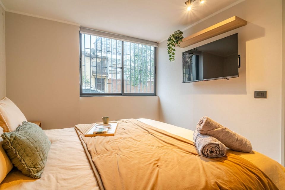 HOM I 2D2B, Calefactor Estacionamiento Lavanderia Apartment in Santiago