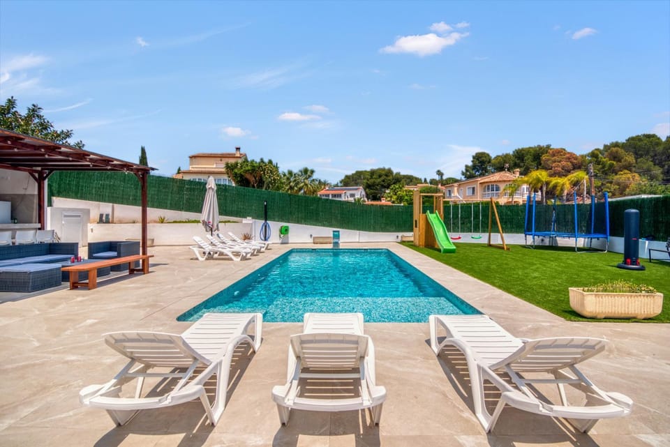 Property building, Living room, Swimming pool