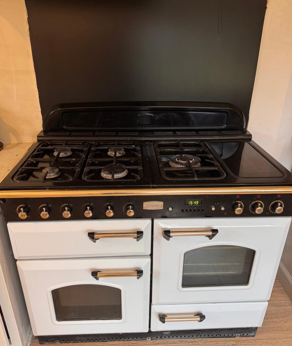 Kitchen or kitchenette, stove