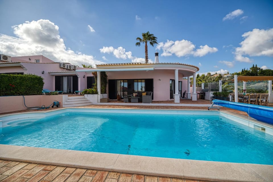 Property building, Pool view, Swimming pool, sunbed