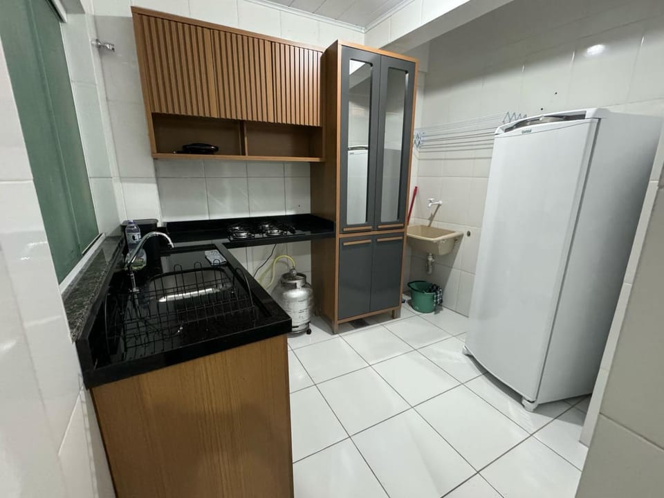 Kitchen or kitchenette, microwave, stove
