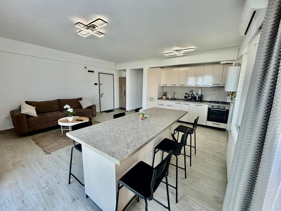 Kitchen or kitchenette, Living room, Seating area, Dining area, dishwasher, oven, stove