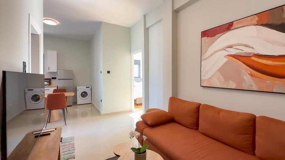 Kitchen or kitchenette, Seating area, stove, washing machine