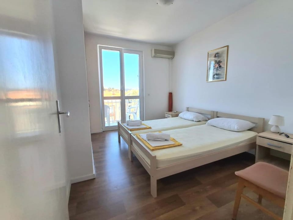 Photo of the whole room, Bedroom, towels, air conditioner