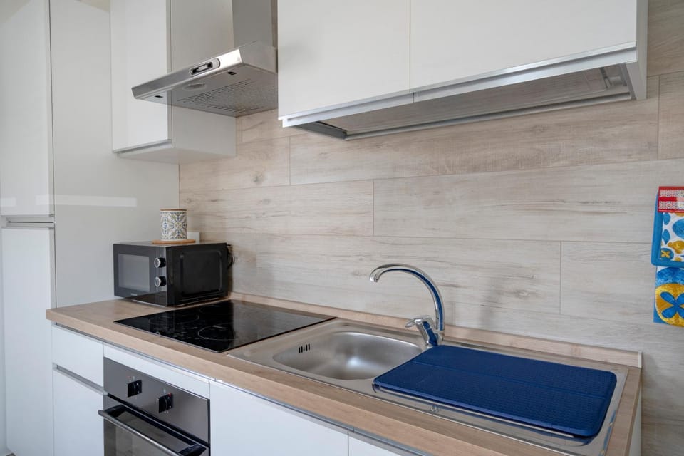 Kitchen or kitchenette, stove