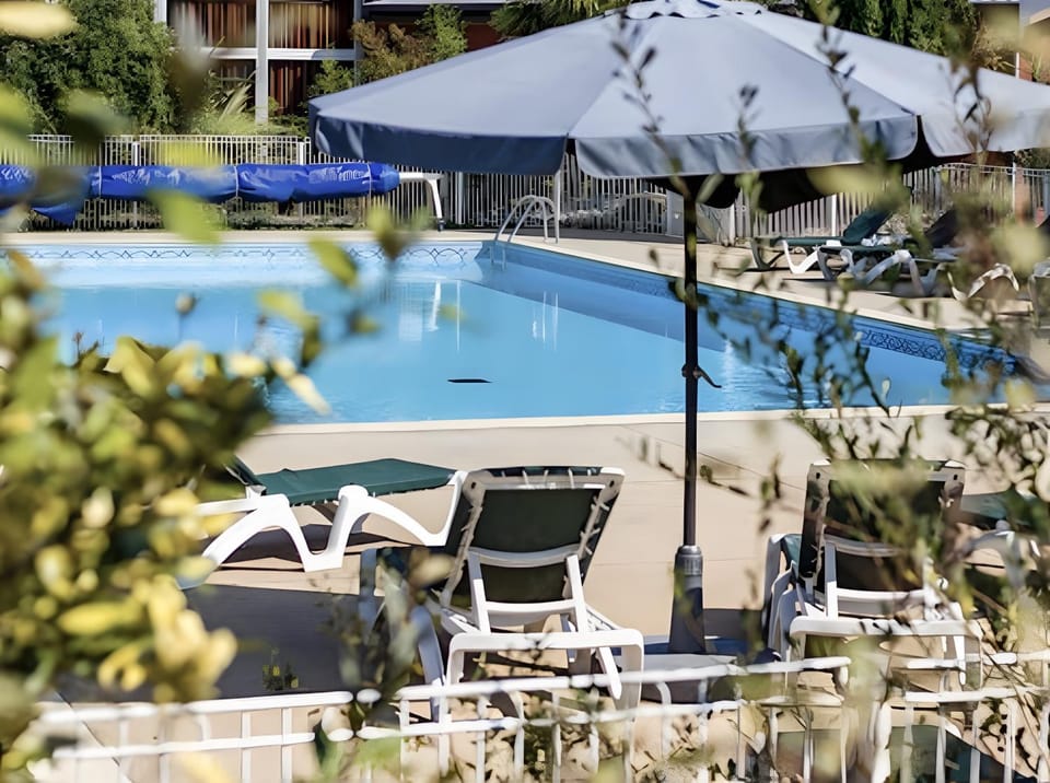 Property building, Living room, Swimming pool