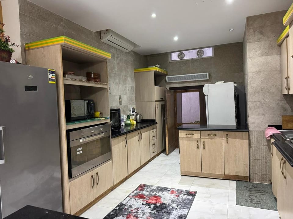 Kitchen or kitchenette, oven, stove