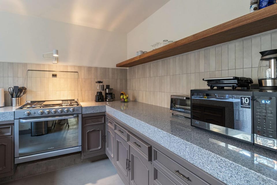 Kitchen or kitchenette, oven