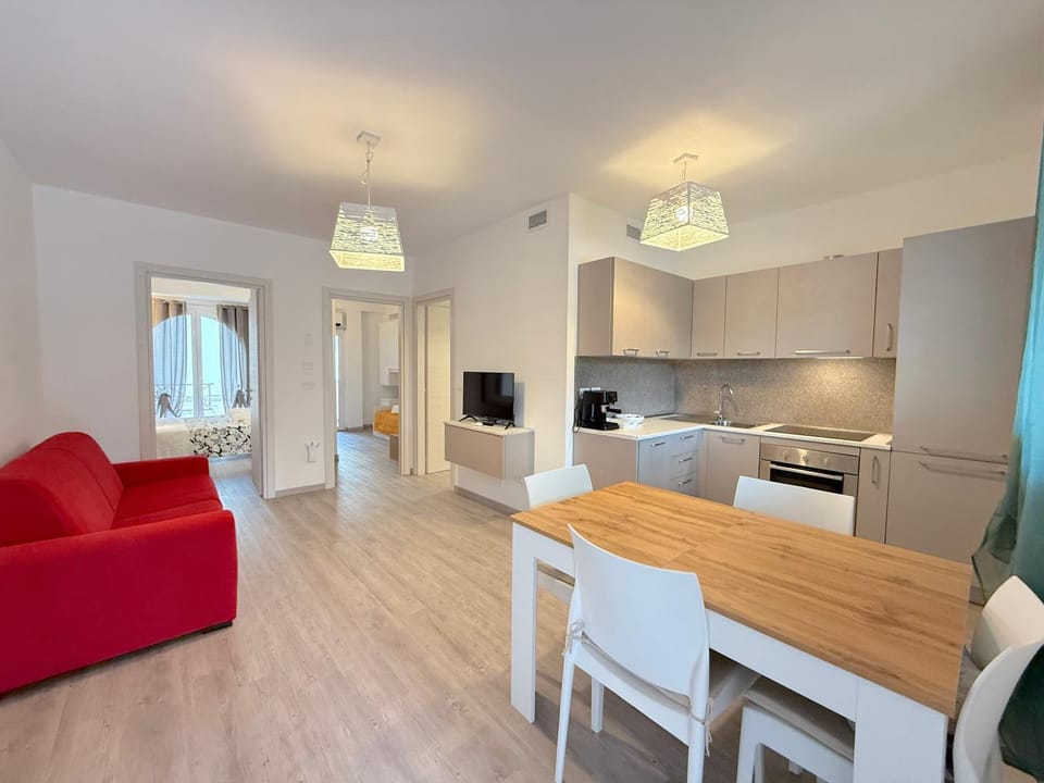 TV and multimedia, Kitchen or kitchenette, Living room, Seating area, Dining area, stove