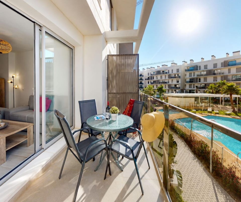 Property building, Patio, Communal lounge/ TV room, Day, View (from property/room), Balcony/Terrace, Living room, Seating area, Dining area, Pool view, Swimming pool, sunbed