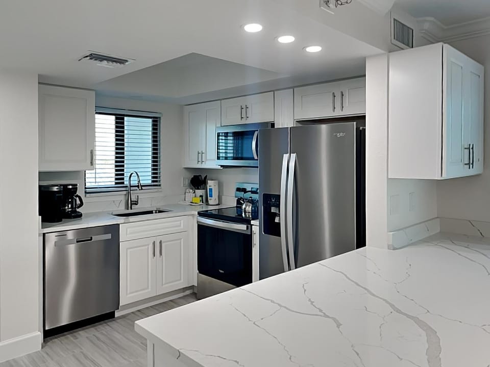 Kitchen or kitchenette, dishwasher, microwave, oven, stove, toaster, kitchen