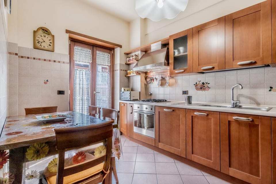 Kitchen or kitchenette, dishwasher, oven, stove
