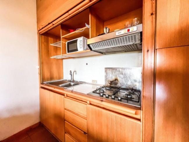 Kitchen or kitchenette, stove