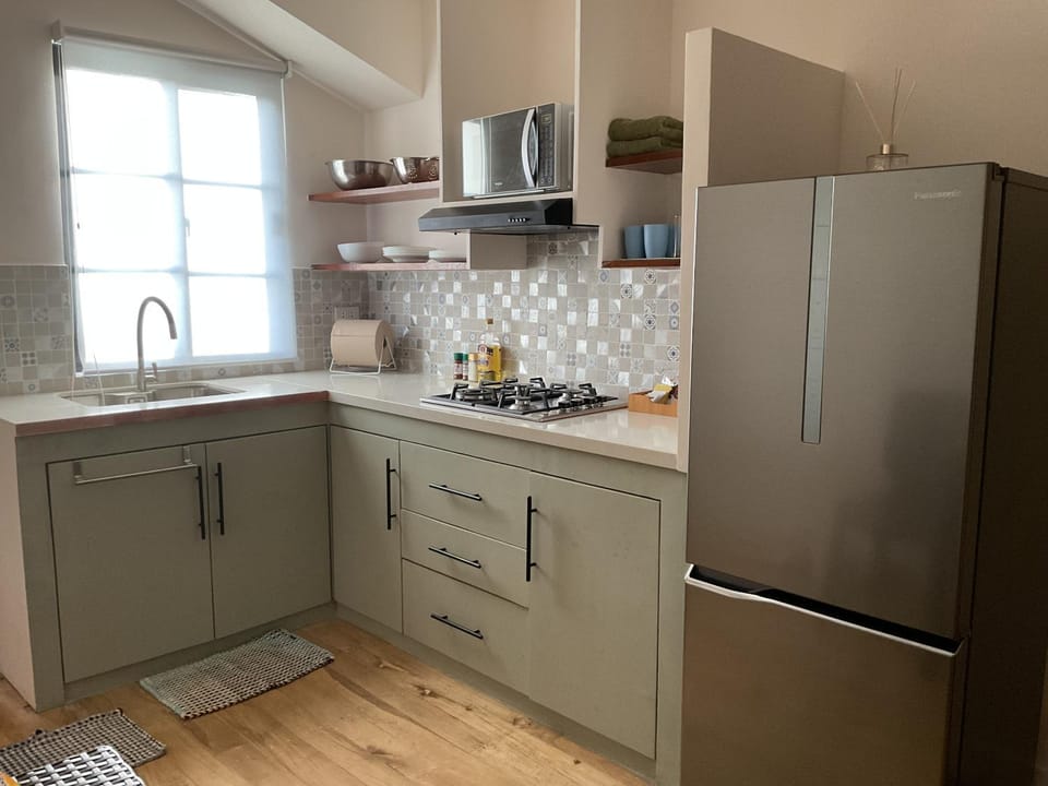 Kitchen or kitchenette, stove