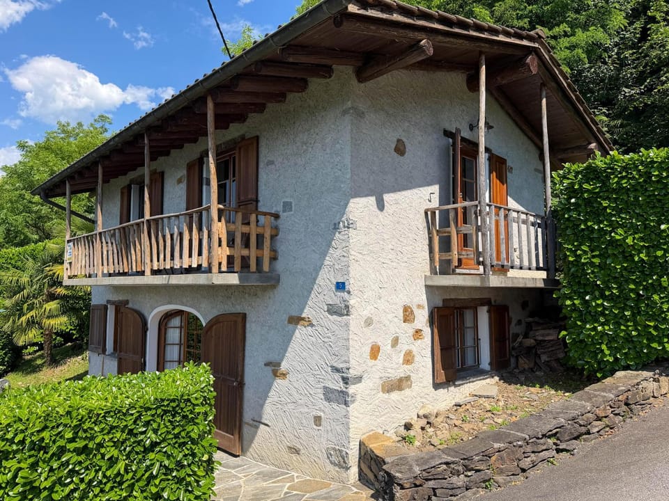 Casa Mathey by HolAp SA House in Locarno