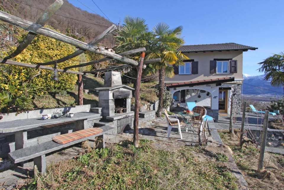 Casa Ai Vigneti by HolAp SA House in Locarno