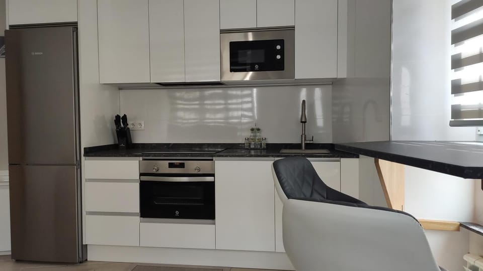 Kitchen or kitchenette, oven