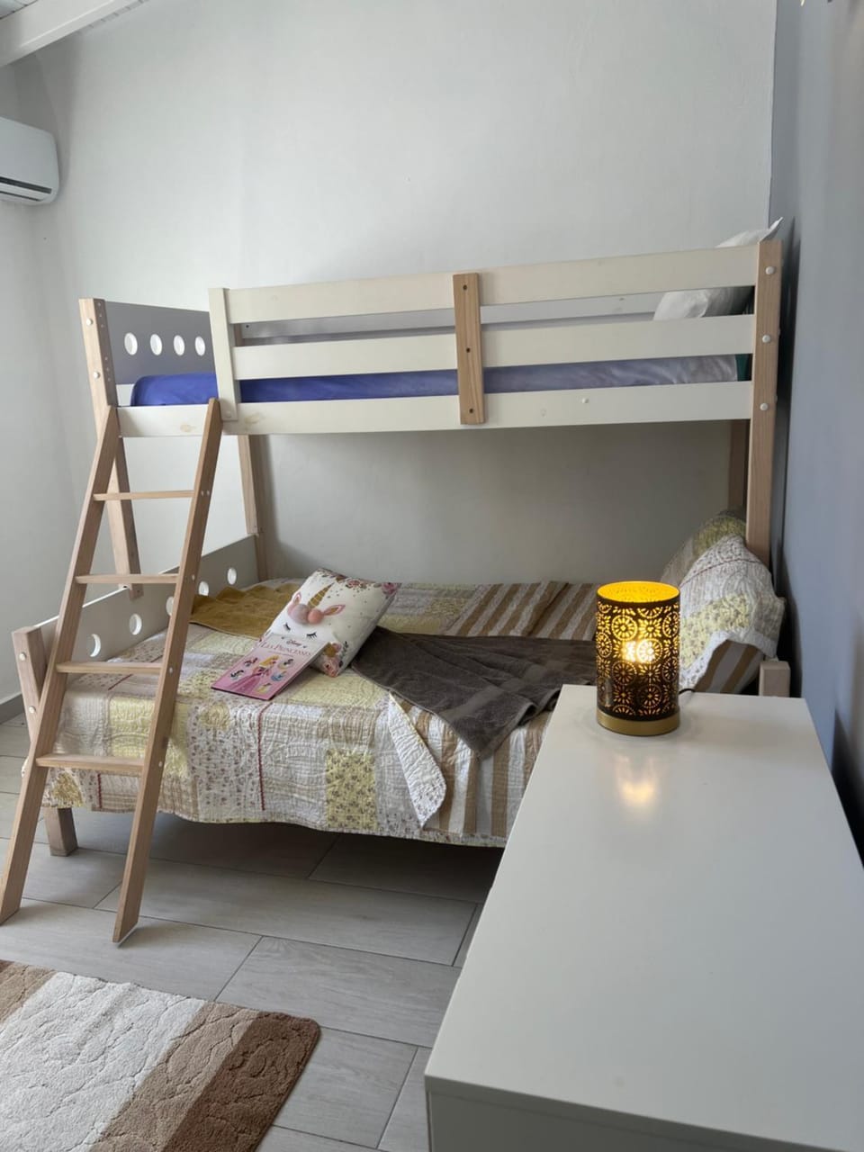 Bed, Photo of the whole room, Bedroom, bunk bed, towels, air conditioner